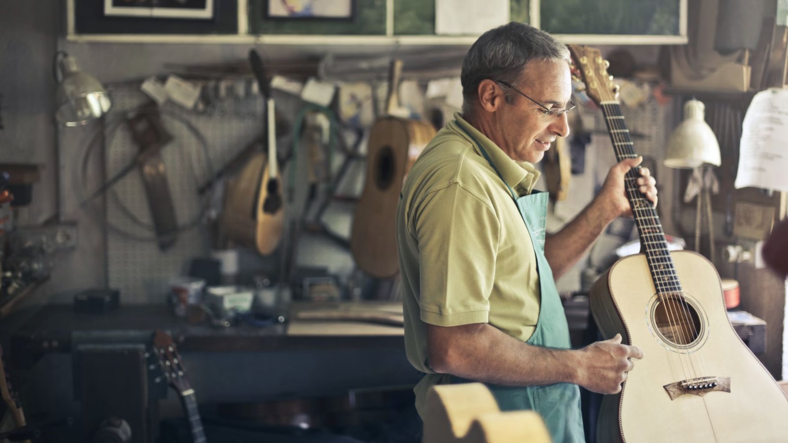 Interior of Bociwuumgroup workshop with professional luthier tools and instruments in natural light